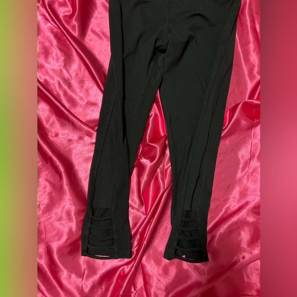 black capri leggings. size small with little design on bottom. good condition